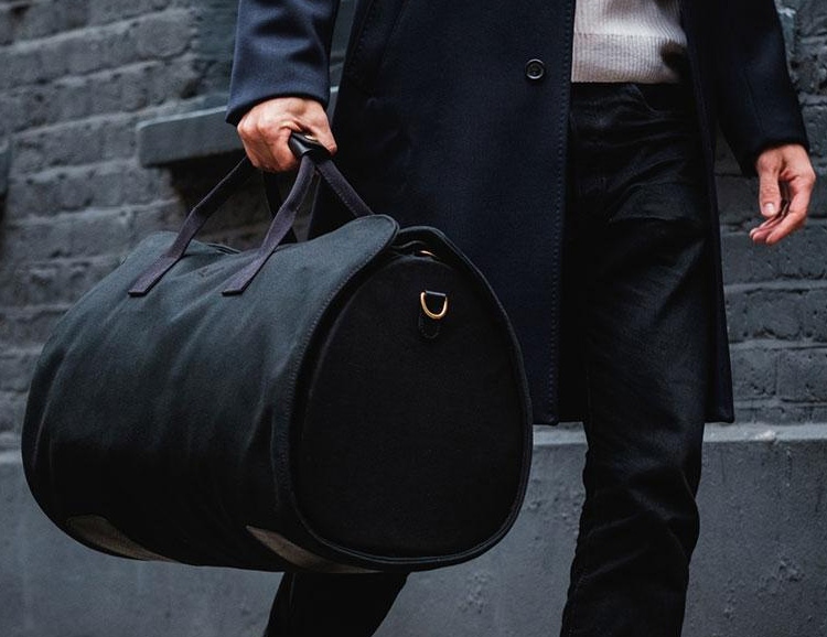 Arrive Wrinkle-Free with this Handsome Travel-Ready Suit Carrier