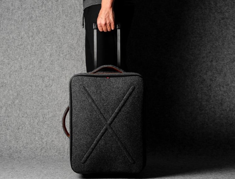 This Rolling Carry-On Looks Luxe In Italian Wool