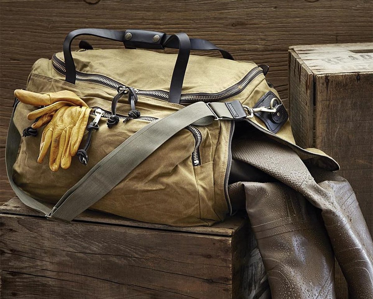 Filson’s Excursion Bag has an Interior Pocket for your Wet, Muddy Gear